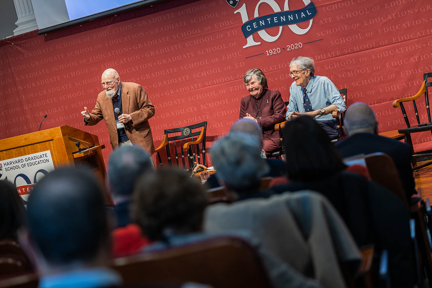 Robert LeVine on stage with Patricia Albjerg Graham and Howard Gardner