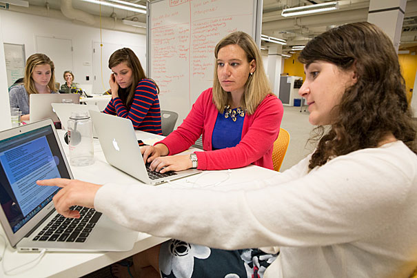 Kate Steinman, Jessica Yarmosky, Taylor Percival, and Jill Steinman work together on CommonLit, a free online library for middle school teachers. (Photo by Jon Chase, Harvard Staff Photographer.)