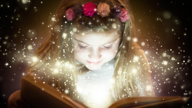 Girl reading book with sparkle concept