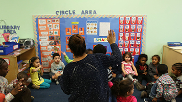 a photograph of an elementary school circle time