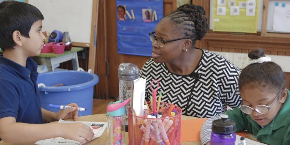 Mona Ford Walker with a student at Winship Elementary