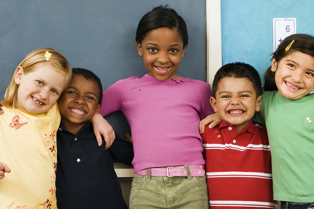 Diverse group of children smiling