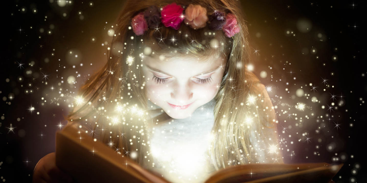 Girl reading book with sparkle concept
