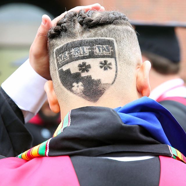 Graduate with crest shaved in his hair