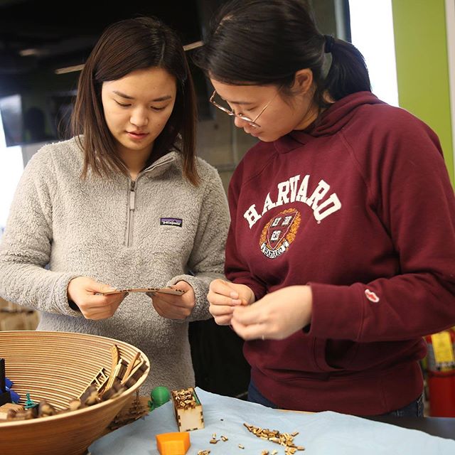 Two women working on a prototype