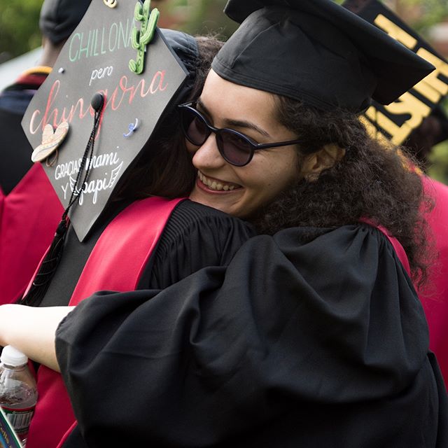 HGSE graduates hugging