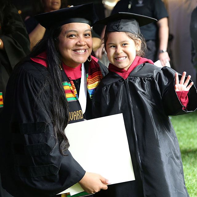 Graduate with her child