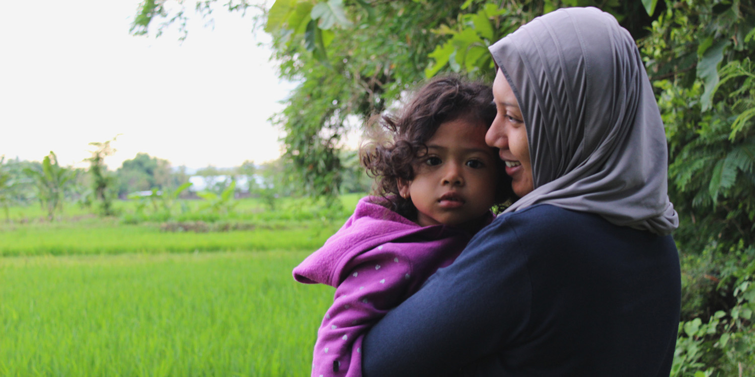 Mother holding child