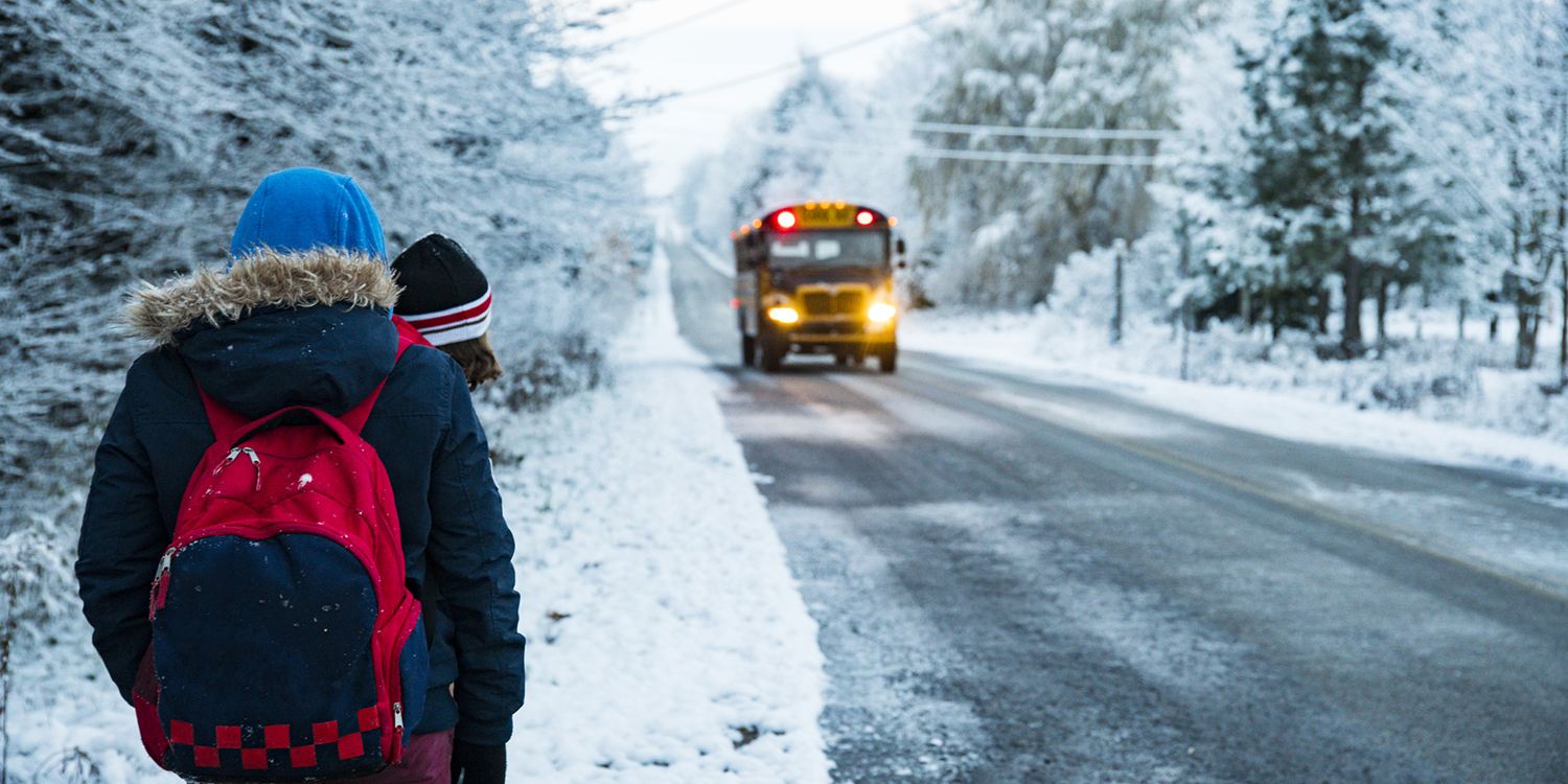 School bus stop in snow