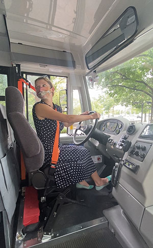Laura Schifter driving electric bus