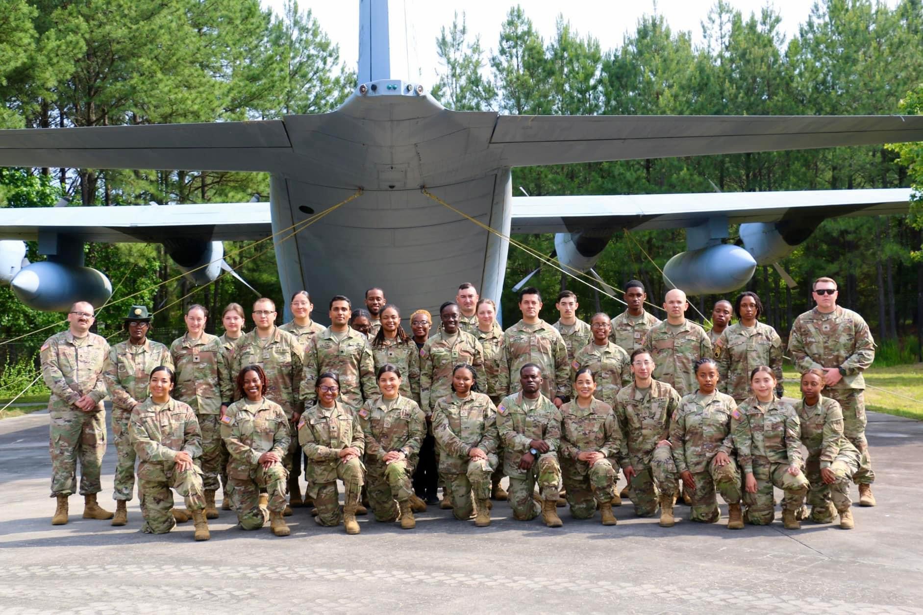 Gathered in front of a plane, Solanki and his full U.S. Army Transportation class, as well as instructors and sergeants