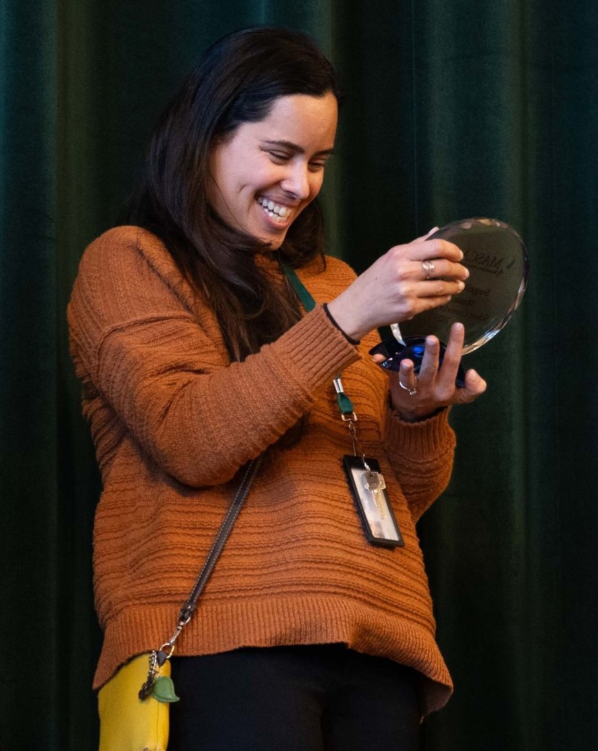 Sugeily Santos accepting her Counselor of the Year award