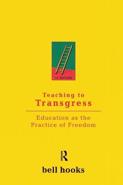 Yellow book cover of "Teaching to Transgress" with a small illustration of a ladder