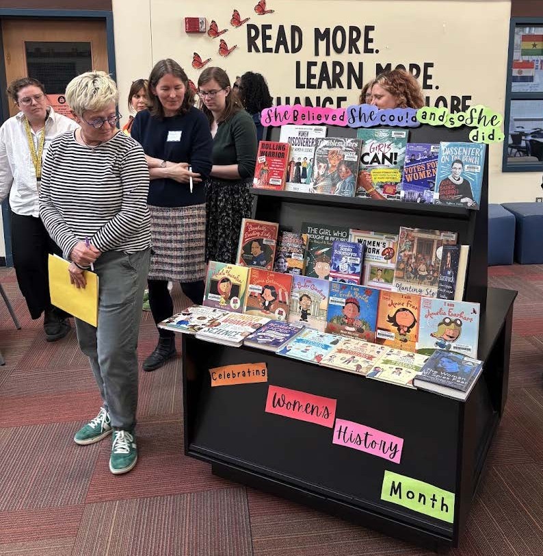 Secondary librarians touring a colleague’s space as part of a peer observation