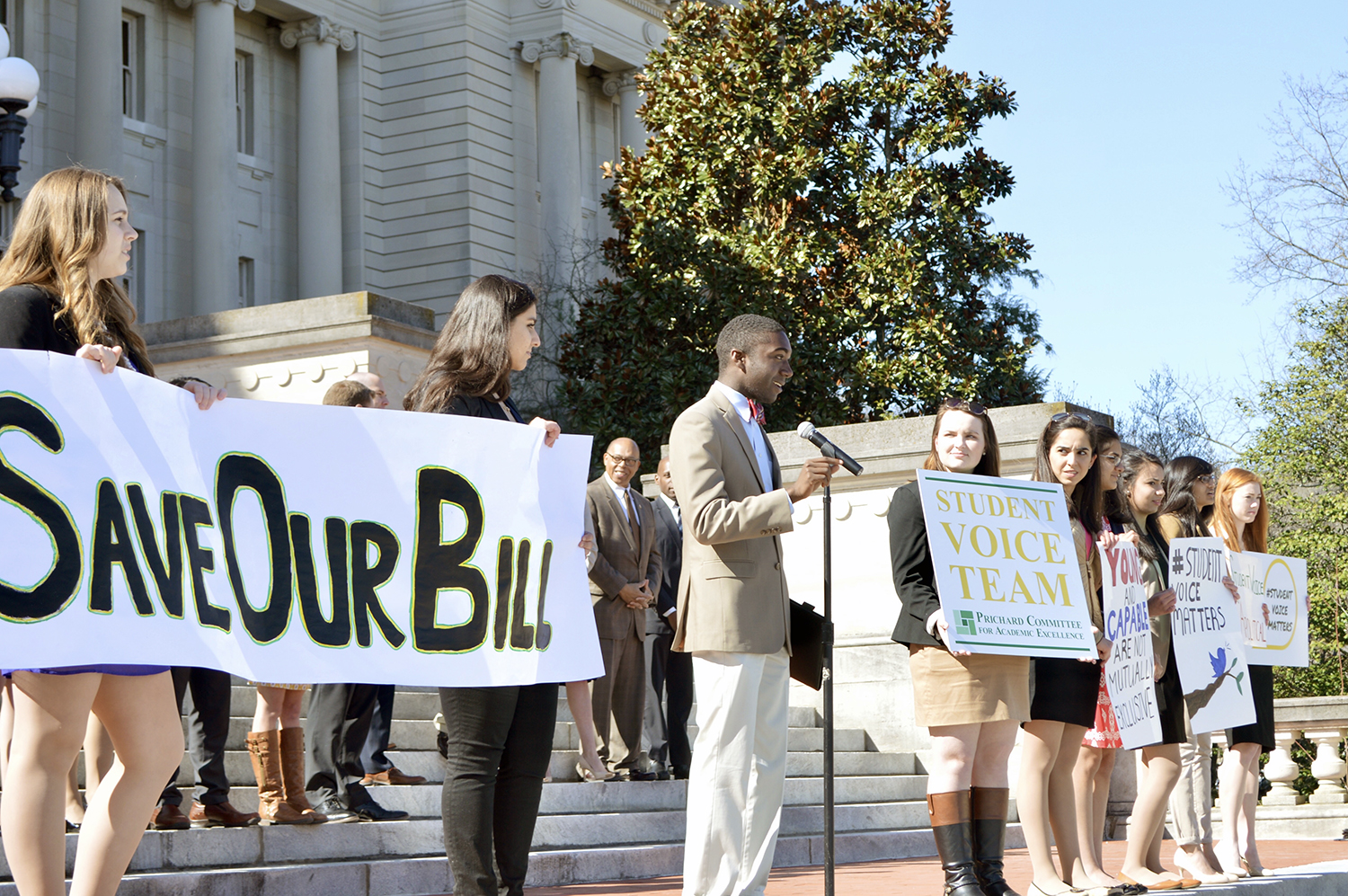 Andrew Brennen speaks at a rally