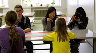 The team spoke with elementary school students at the Central School in Kotka (left to right: Lynch, Shih, and Joo).
