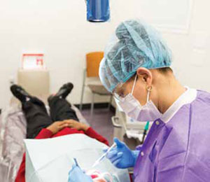 Student getting dental care