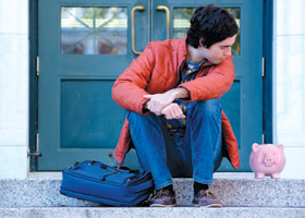 Student with Piggy Bank