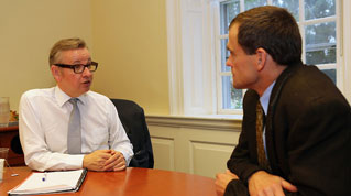 British Secretary of State for Education Michael Gove speaks with Dean James Ryan during his visit to the Ed School.