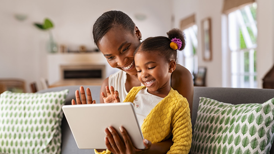Parent and child on a tablet