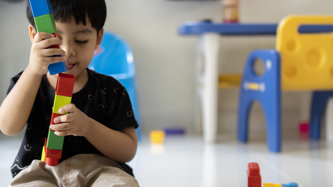 Child playing with blocks