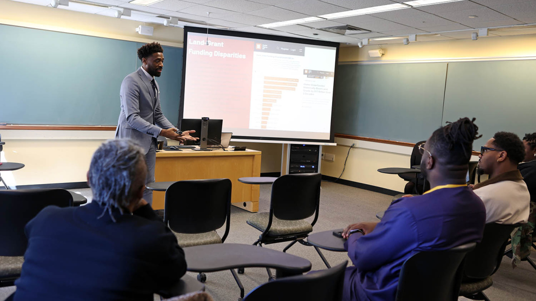 Man presenting to a classroom