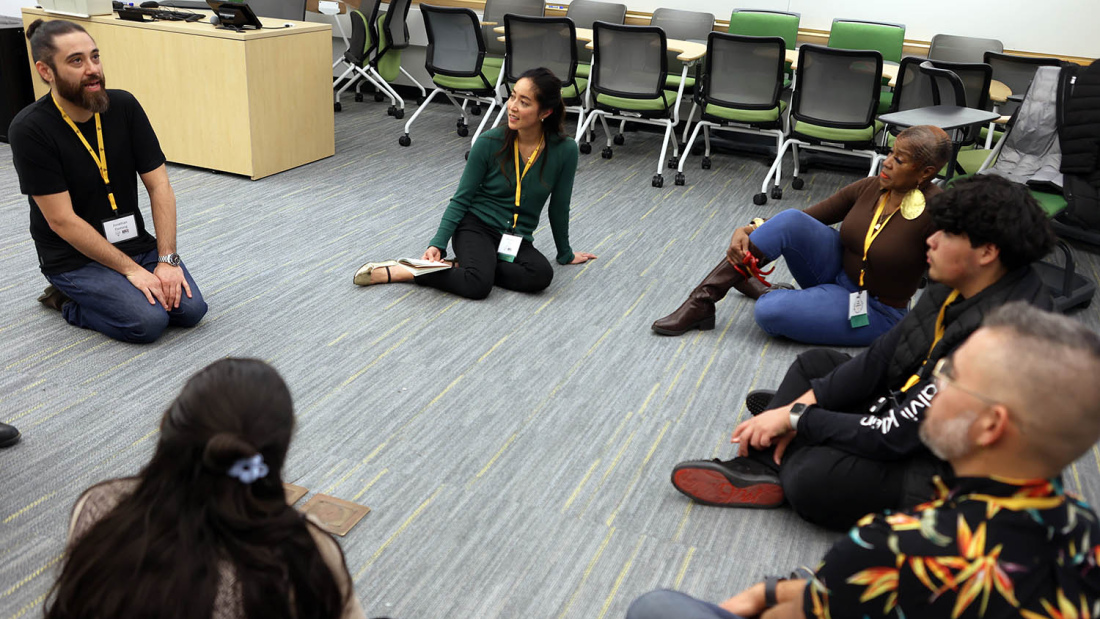 Woman leading a group on floor