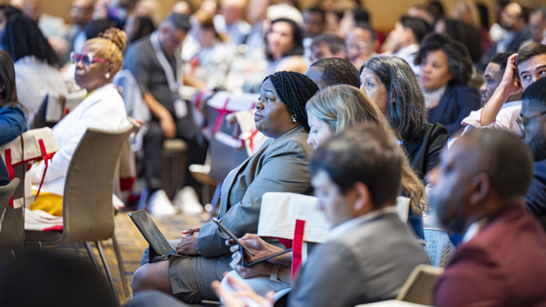 Attendees at the EdRedesign Summer Institute have a conversation