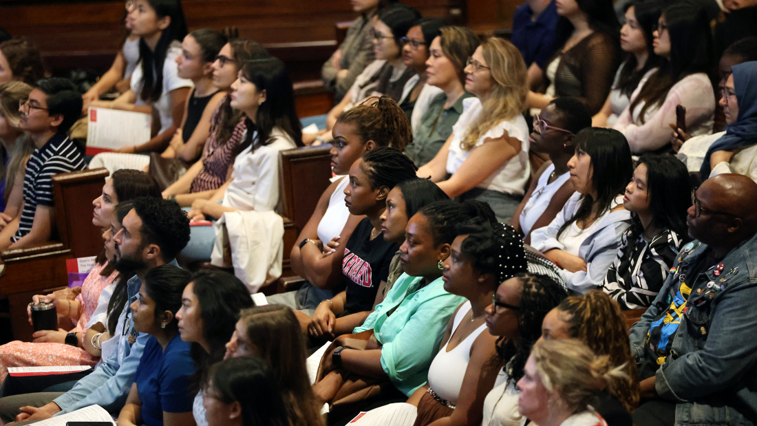 Students sit in Sanders Theatre for Welcome Day