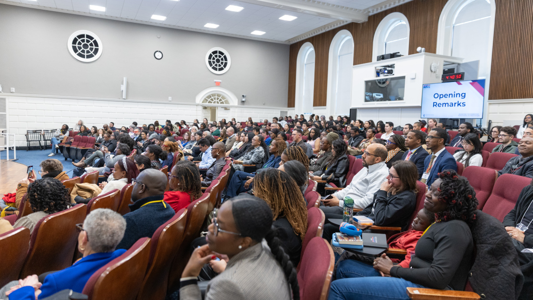 A full audience at Askwith Hall listens to the AOCC speakers