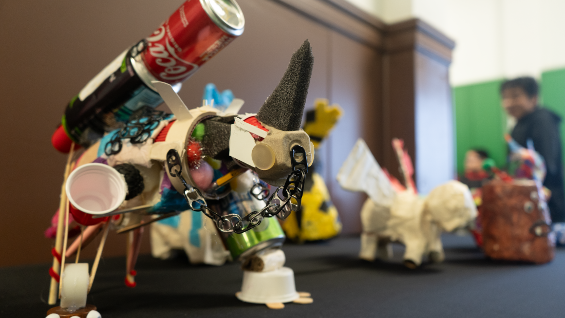 Students created colorful alebrijes, a form of Mexican folk art inspired by imaginary creatures. This is a creature made up of material like soda cans, styrofoam, earbuds, and tape rolls
