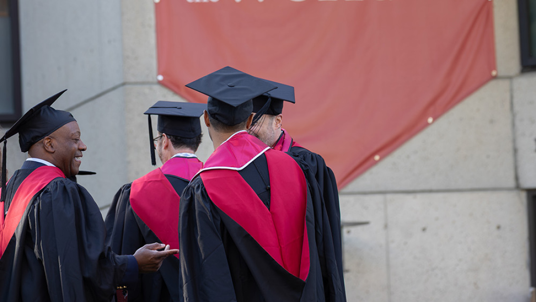 Grads outside of Gutman Library