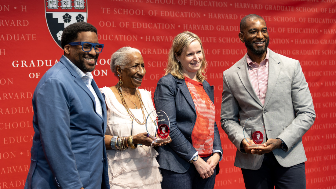 Julian Braxton and Dean Nonie Lesaux stand with Alumni Council Award winners Caroline Hunter and Steven Chambers