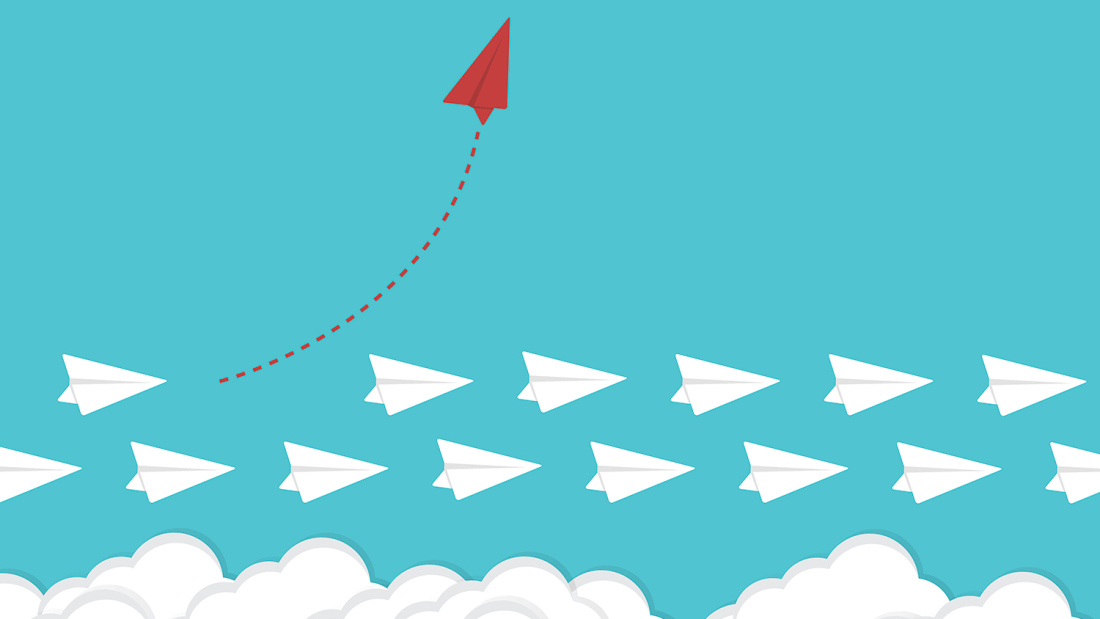illustration of white paper airplanes, with one red airplane shooting skyward