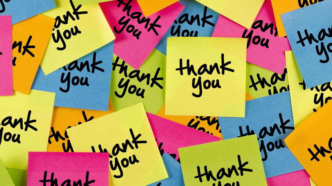 Bright post-its reading "Thank you"