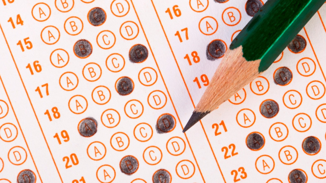 close-up of a pencil and a standardized test sheet