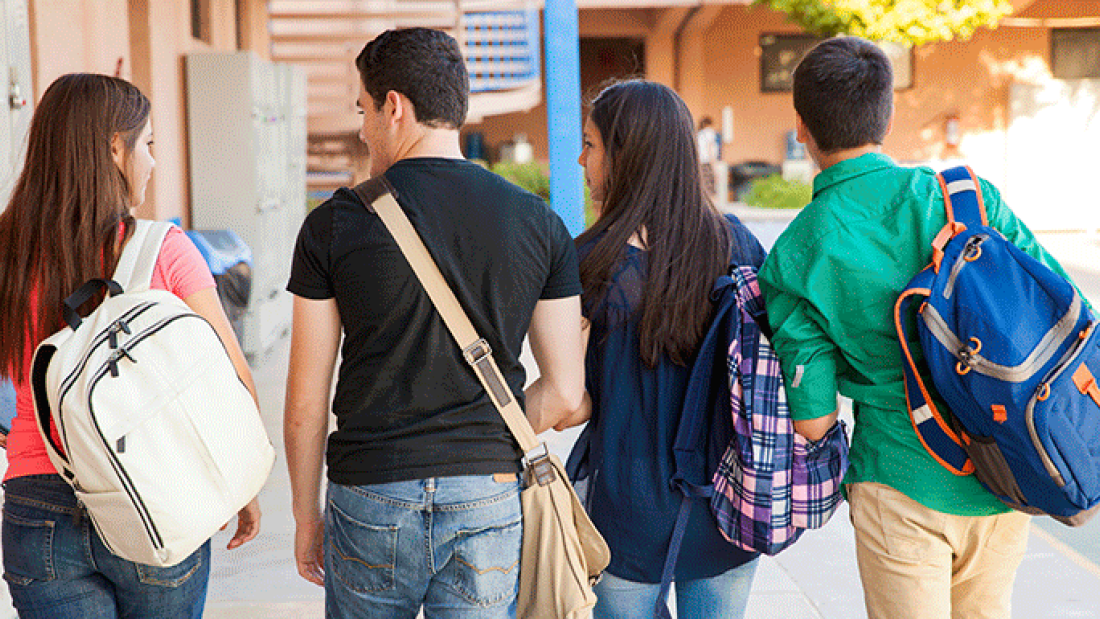 teenage students with backpacks