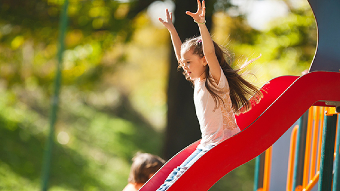 Girl on slide