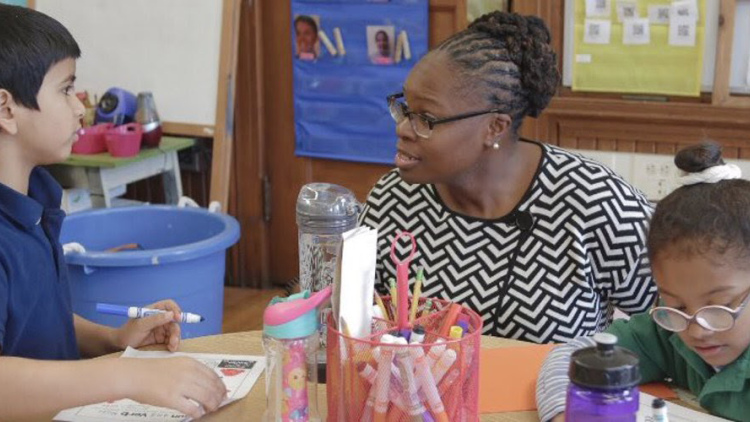 Mona Ford Walker with a student at Winship Elementary