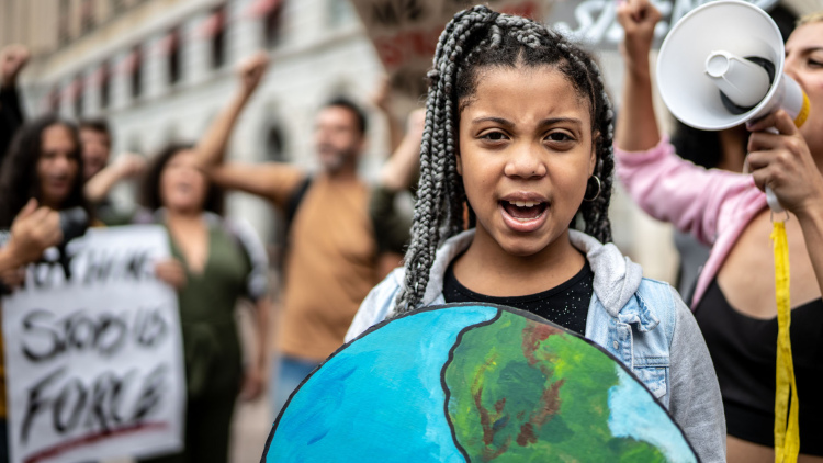 Child at a climate change demonstration