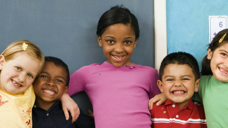 Diverse group of children smiling