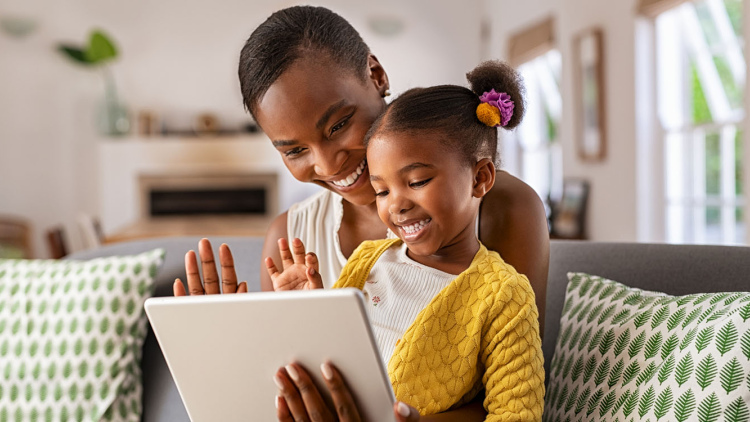 Parent and child on a tablet
