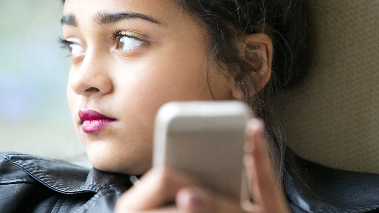 Teen on cell phone