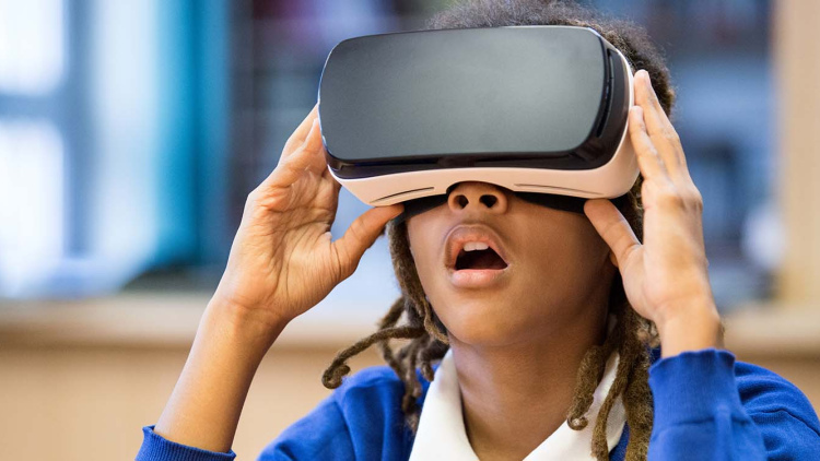 Student with virtual reality headset Student with virtual reality headset
