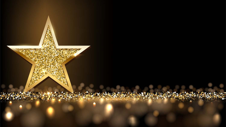 Gold star with confetti