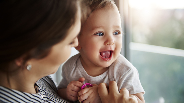 Happy toddler with mother