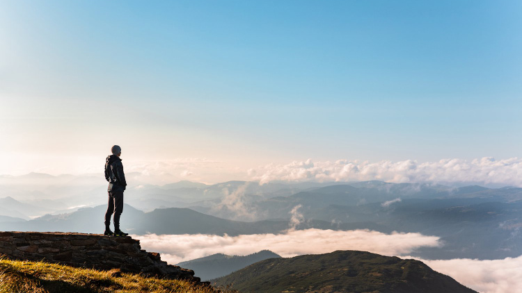Man on edge of a cliff
