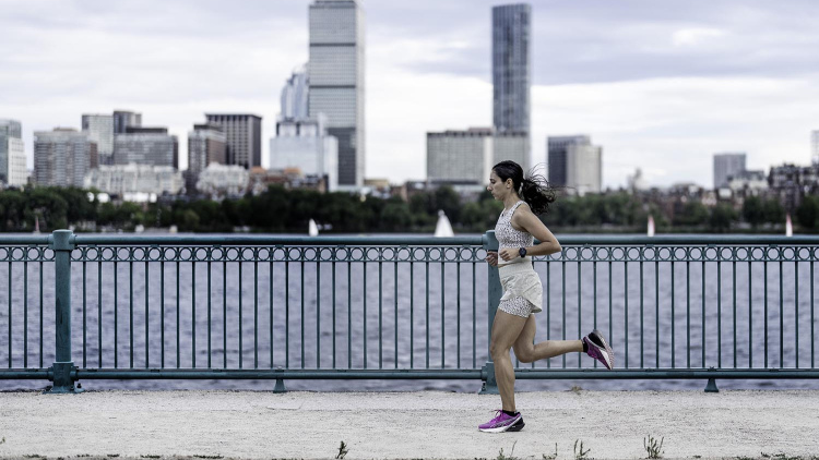 Alia Qatarneh running along the Charles River