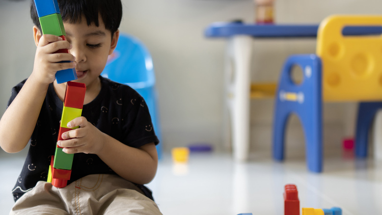 Child playing with blocks