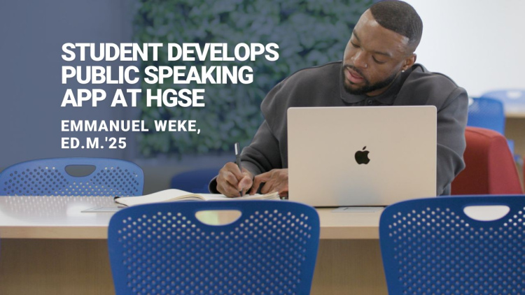Emmanuel Weke works on his computer